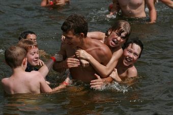 Kids playing in lake at a camp.jpg